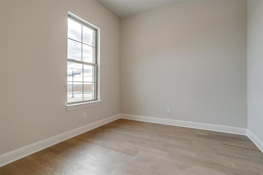 Empty room featuring light hardwood / wood-style floors