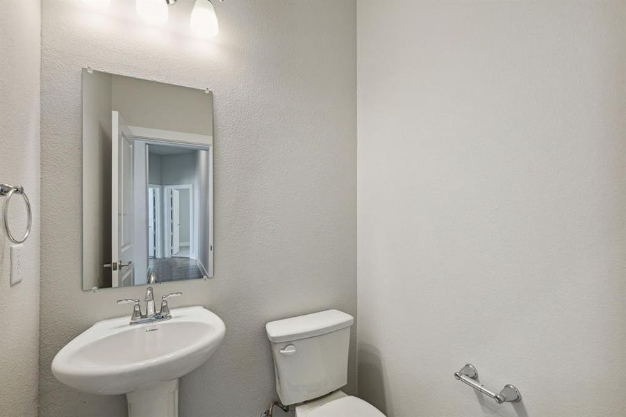 Bathroom with sink and toilet