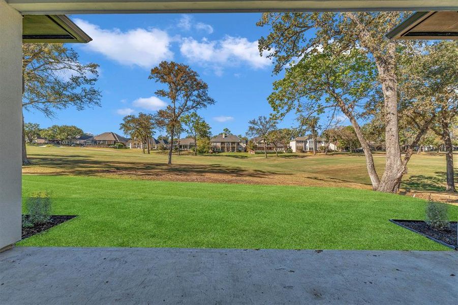 Enjoy your morning coffee on the breezy, covered back patio with peaceful views of the Bentwater Golf Course