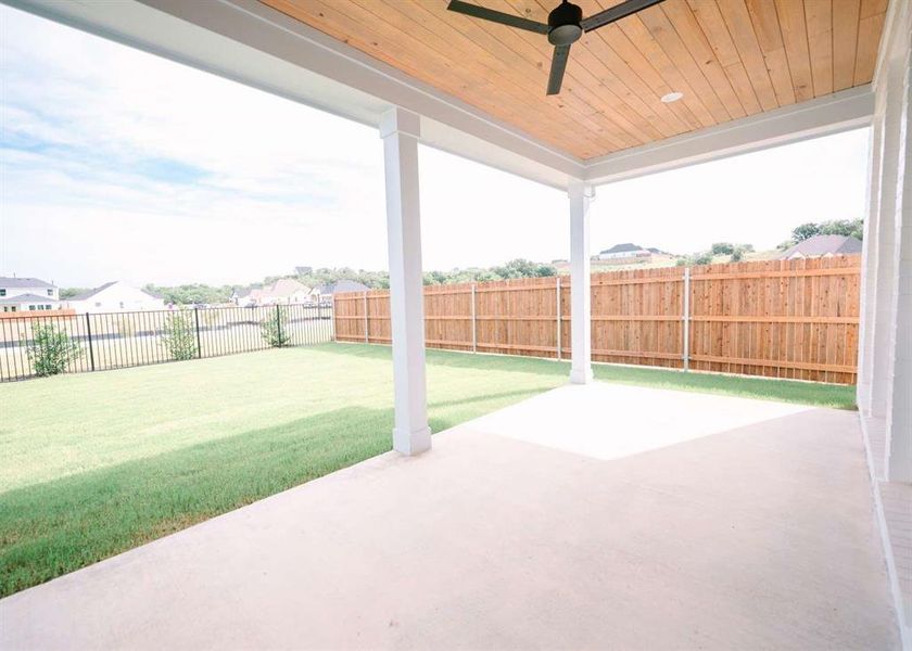 View of terrace featuring ceiling fan