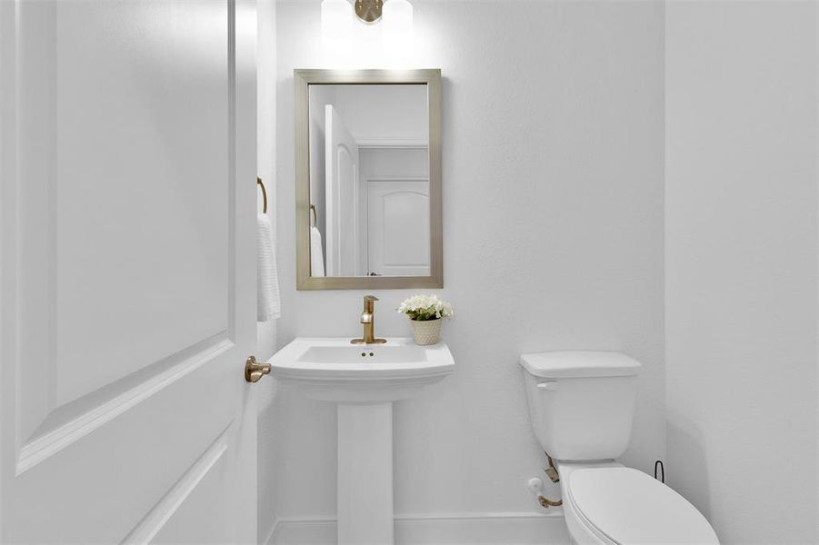 Powder bathroom off the family room for guests.