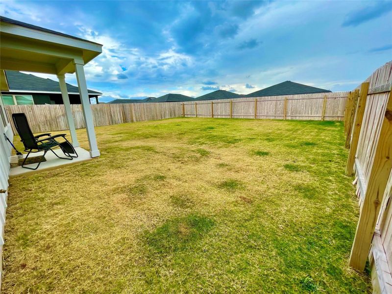 Large backyard, fully sodded, fenced and irrigated.