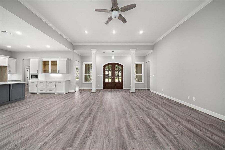 The open floor plan seamlessly connects the living room and kitchen, ideal for cozy family evenings.