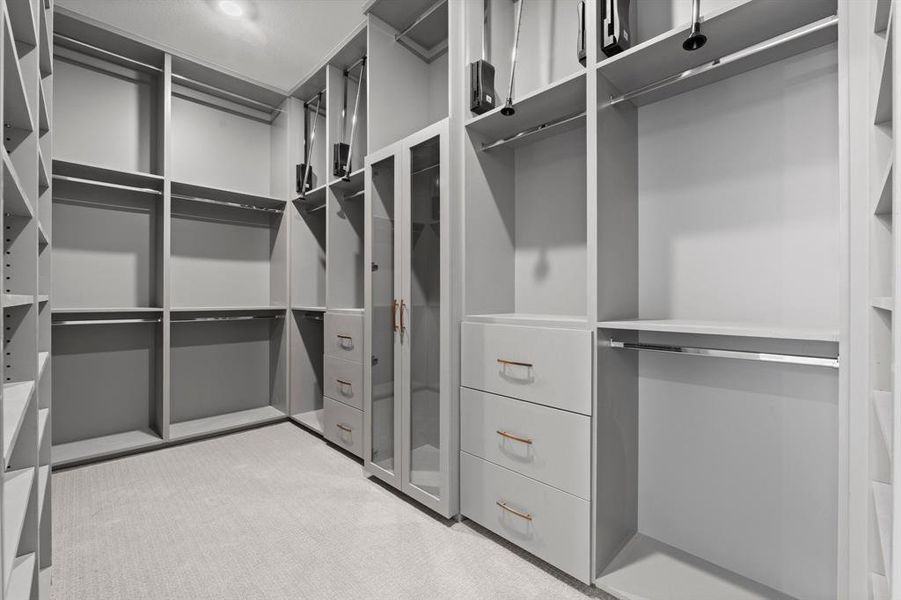 Primary Bedroom Closet with Built-in Organizer