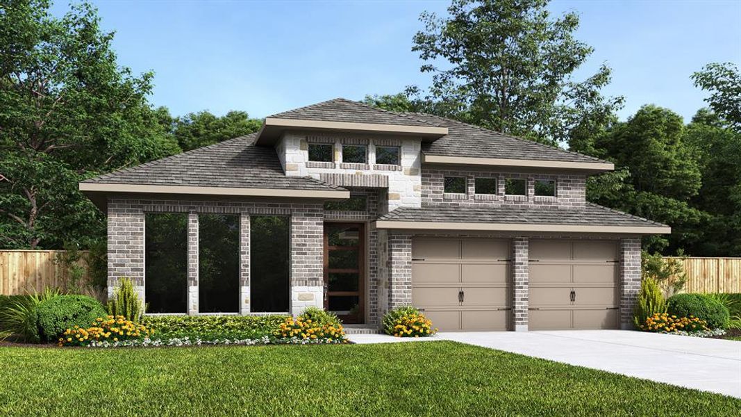 View of front of property with a front yard and a garage