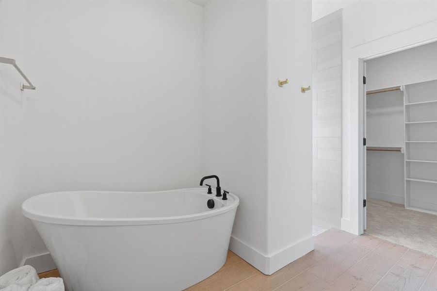 Gorgeous soaking bathtub in Primary Bedroom with walk-in closet