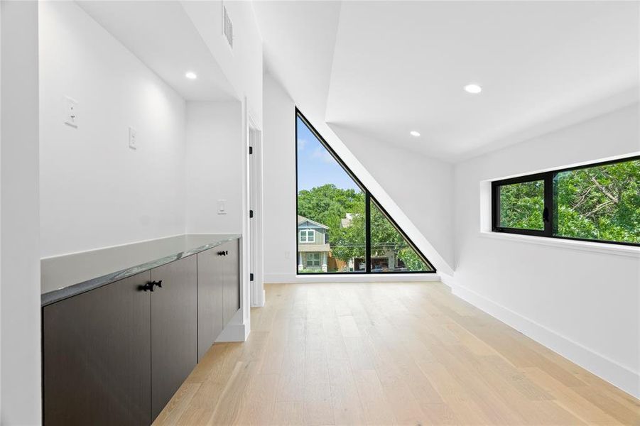 Floor to ceiling transom windows with views of Downtown