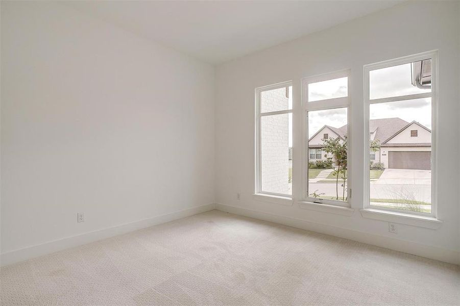 View of carpeted spare room