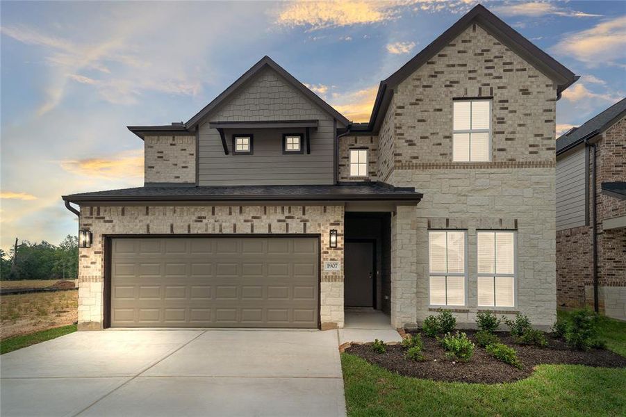 Welcome home to 1907 Scarlet Yaupon Way located in Barton Creek Ranch and zoned to Conroe ISD.