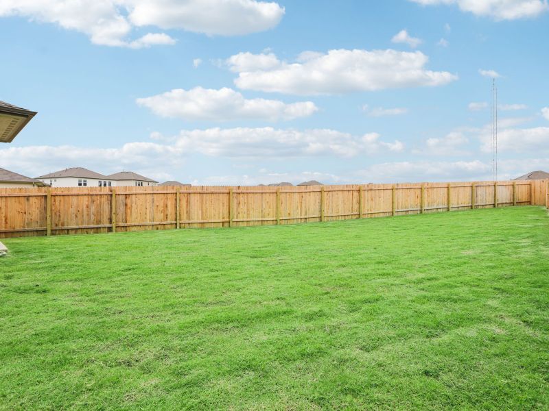 The expansive backyard is great for a birthday party or BBQ.