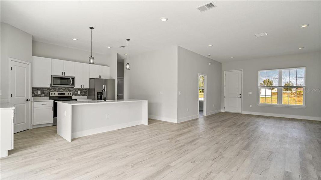 Living room + Kitchen