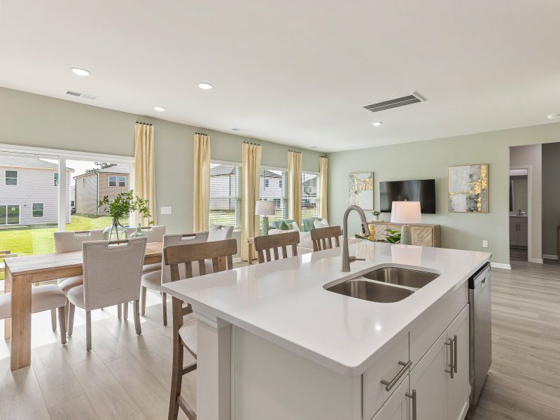 Kitchen in the Chatham floorplan at a Meritage Homes community in Angier, NC.