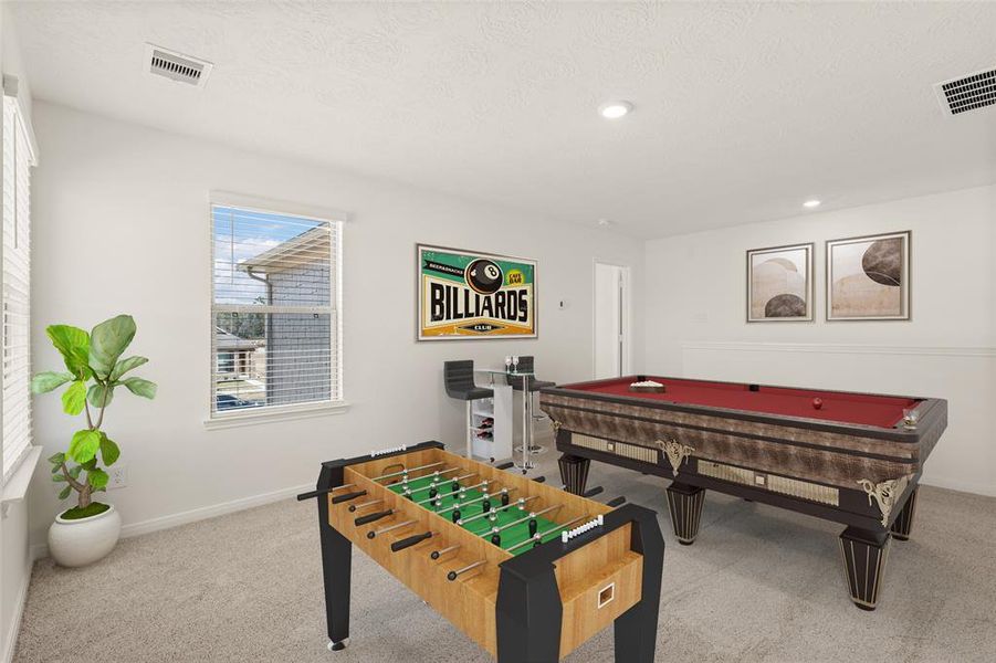 Come upstairs and enjoy a day of leisure in this fabulous game room! This is the perfect hangout spot or adult game room, this space features plush carpet, high ceiling, recessed lighting, custom paint and large windows with privacy blinds.