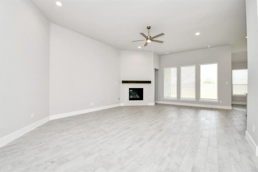 Take another glimpse into the heart of the home with this additional view of the family room—a sprawling space ready to accommodate all your gatherings.