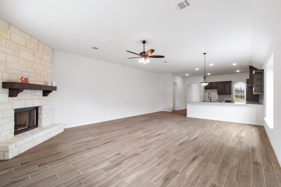 Family Room | Concept 2533 at Abe's Landing in Granbury, TX by Landsea Homes