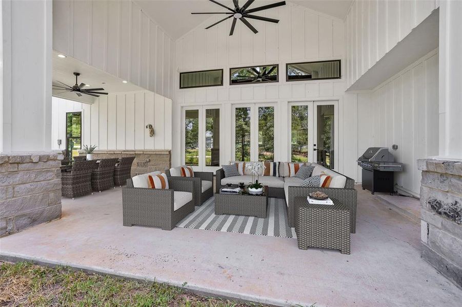 Virtually staged back porch shows the comfort potential to be had!