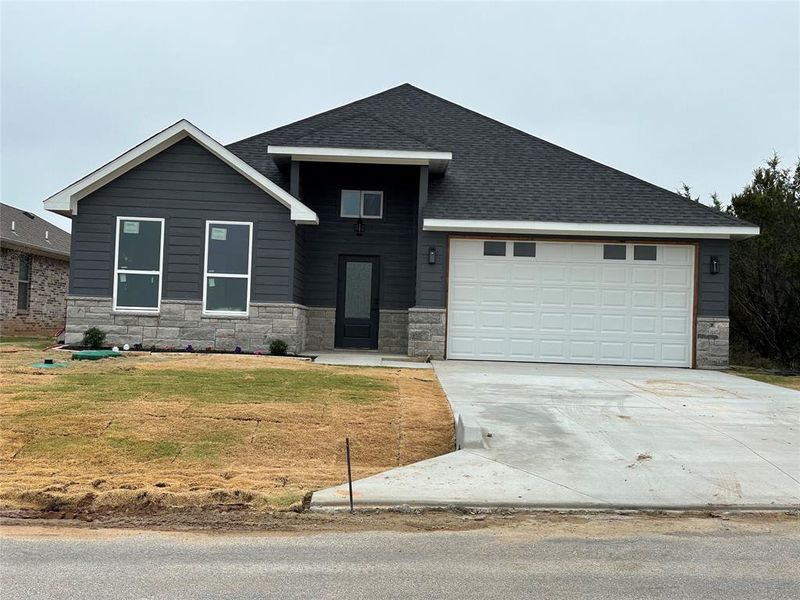 View of front of home with a garage