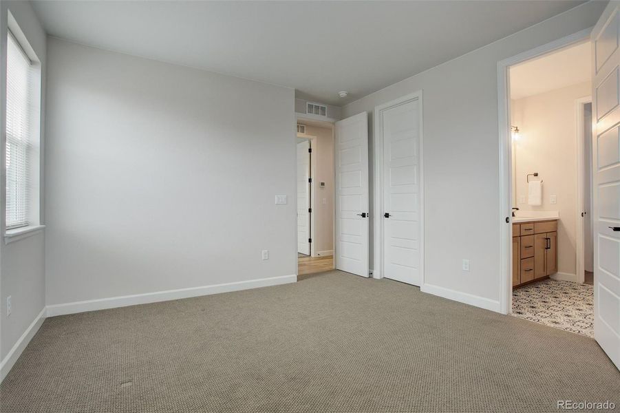 Bedroom 2: upper level, ensuite bath