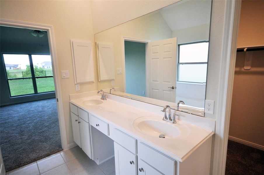 Dual Vanities and a knee space in the master bath. And, yes, Medicine Cabinets are still standard at Cervelle Homes.