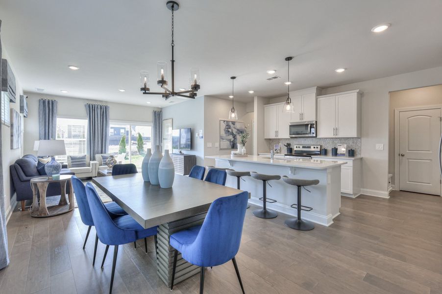 The stunning open-concept floorplan allows for an easy flow between the kitchen and dining areas.