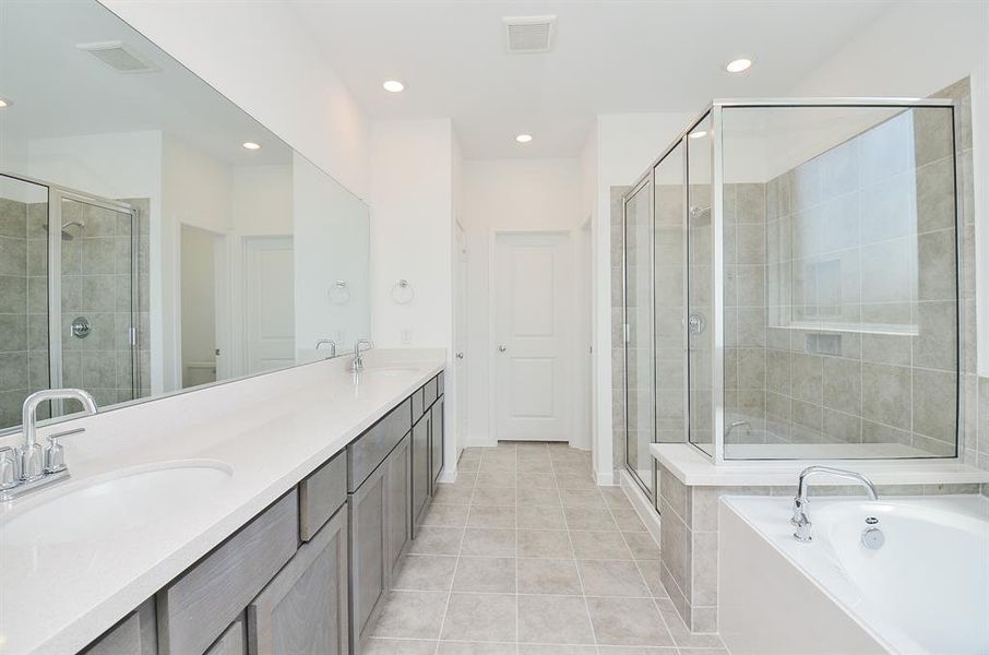 Primary bathroom- Dual sink, walk in oversize shower and soaking tub