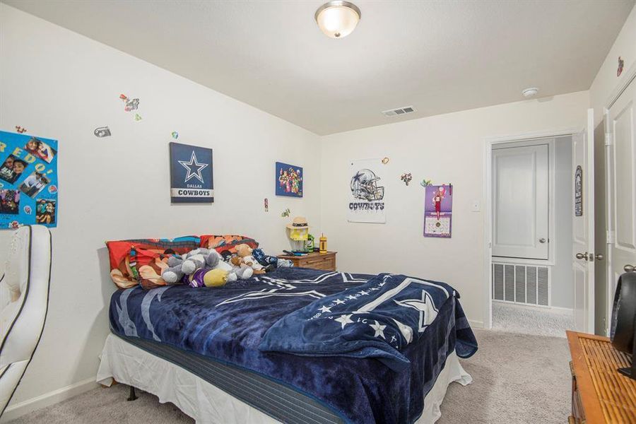 Bedroom featuring carpet floors