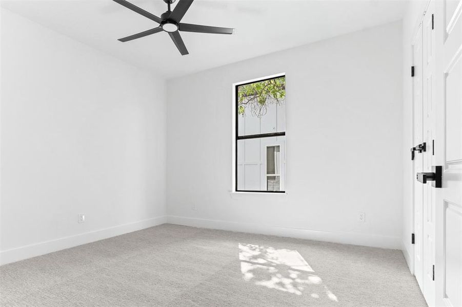 Unfurnished room with carpet flooring and ceiling fan