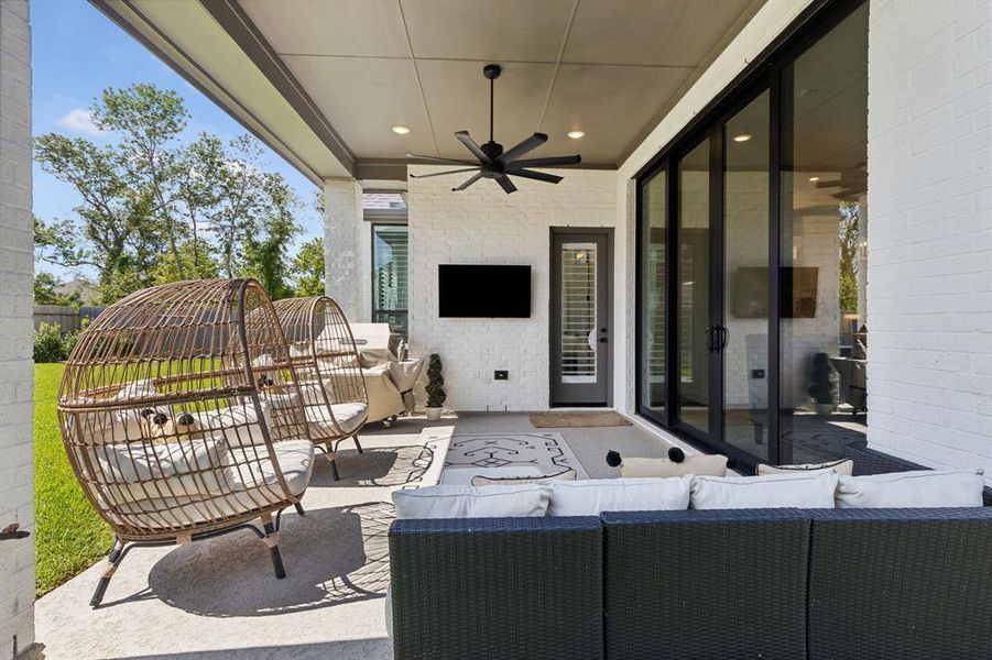 The wide patio has tons of space for al fresco dining. Chat with friends over cocktails, as the kiddos and dogs play in the fully fenced-in backyard.