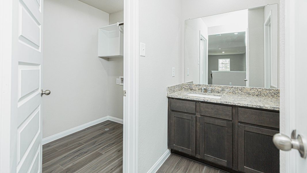 Secondary Bathroom and Laundry Room