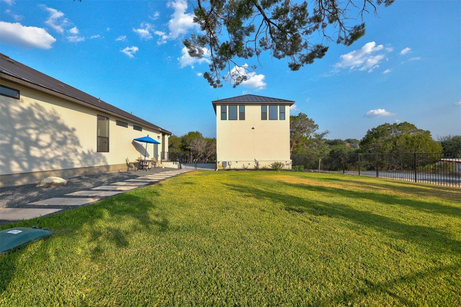 Side yard, separately fenced. Could use for pets, a swingset or lots of other options..