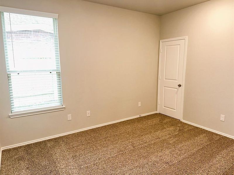 Bedroom 2 is roomy & has a walk in closet