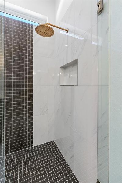 Bathroom with a tile shower