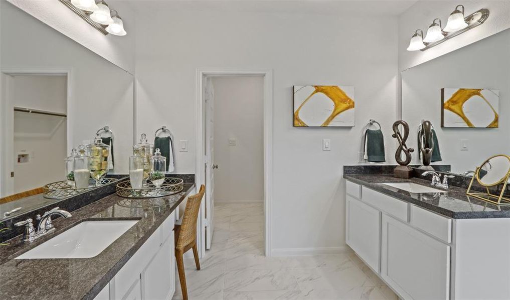 Tranquil owner's bath with dual vanities (*Photo not of actual home and used for illustration purposes only.)