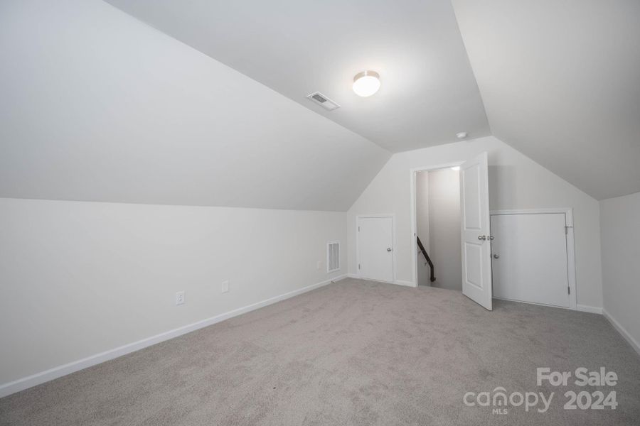 Large Bonus Room with Storage Closets