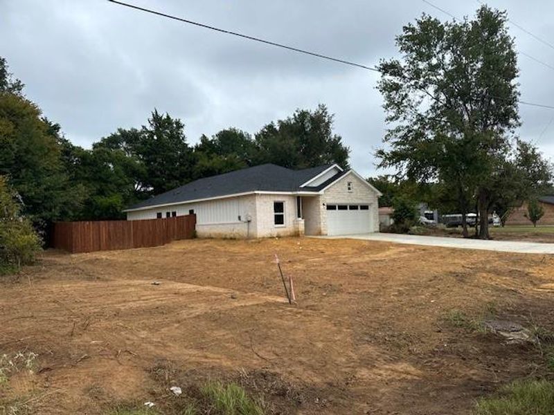 View of front of home with a garage