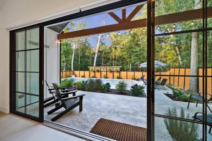 Tempered Glass slider doors lead to your private pool