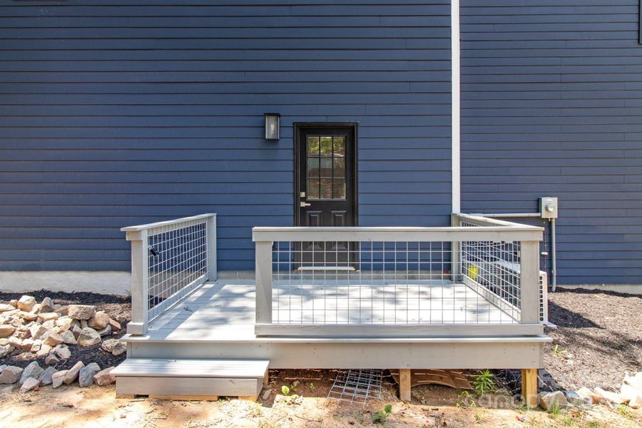 Lovely deck features galvanized panels