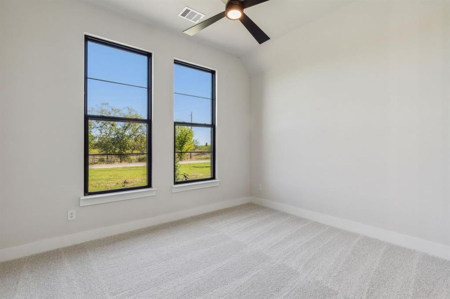 room featuring carpet and ceiling fan