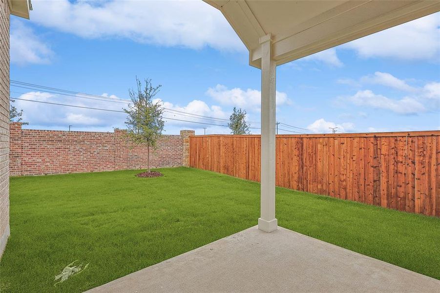 View of yard with a patio