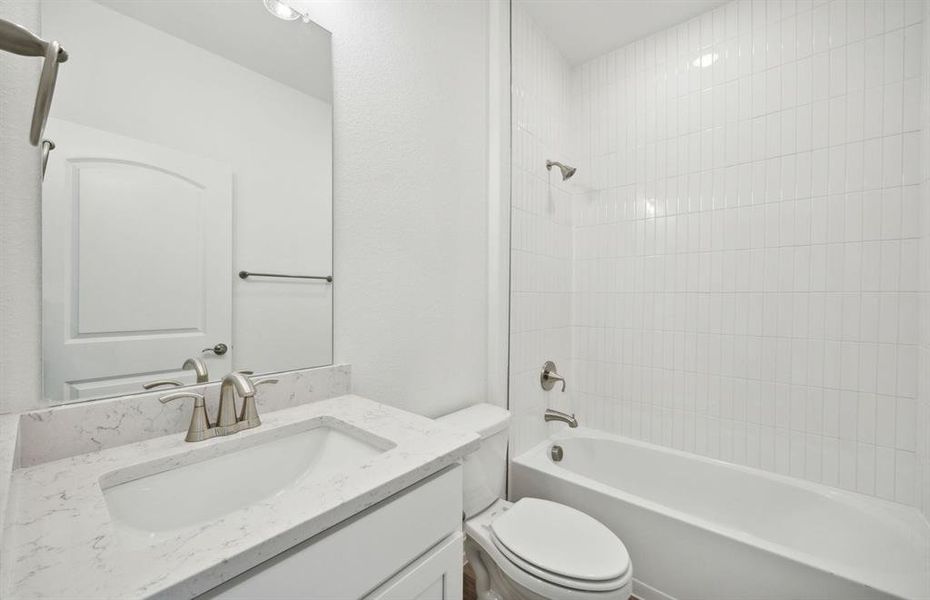 Premium finishes in secondary bathroom *real home pictured