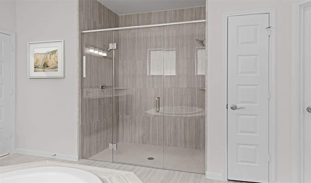 large walk-in shower in primary bath (*Photo not of actual home and used for illustration purposes only.)