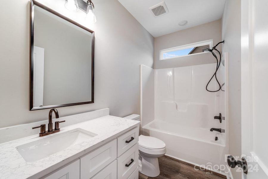 Secondary Bathroom-ALL pics are of previous builds and are for visual purpose only- Color Schemes Interior & Exterior will vary based on Builder's discretion.