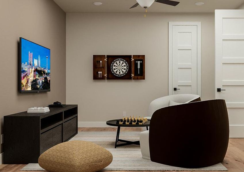 Rendering of the media room showing a
  media cabinet with tv left, a dartboard centered on the wall, and two
  matching chairs with table on the right.