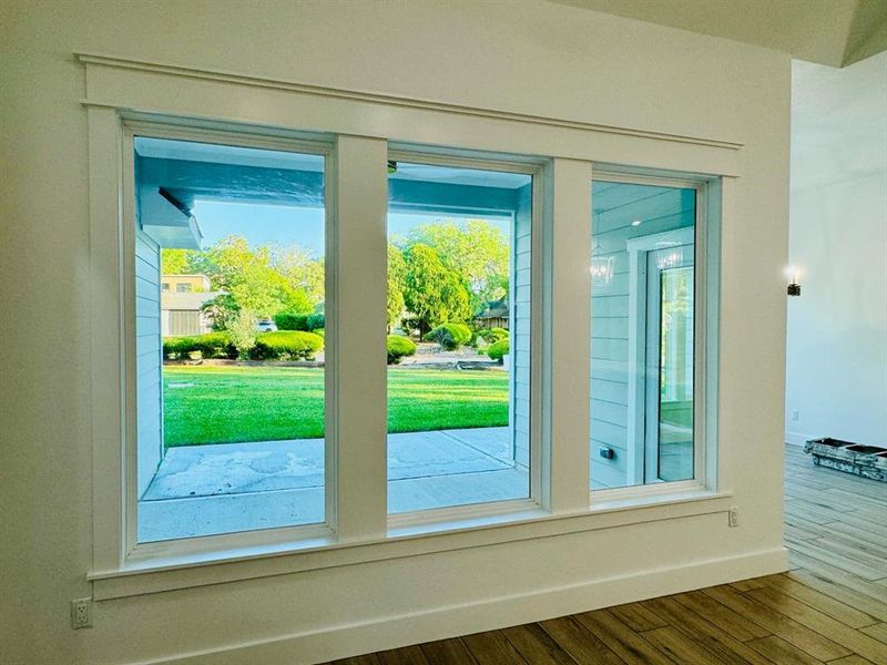 Beautiful trimmed windows in the open areas and primary bedroom