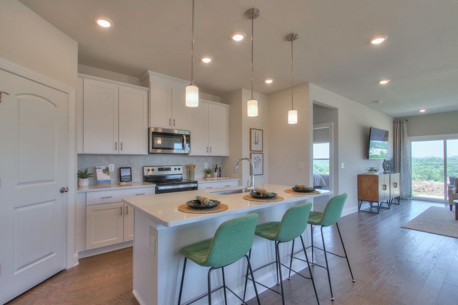 Prep dinner in the kitchen while entertaining guests. Photography from Skyridge in Nashville.