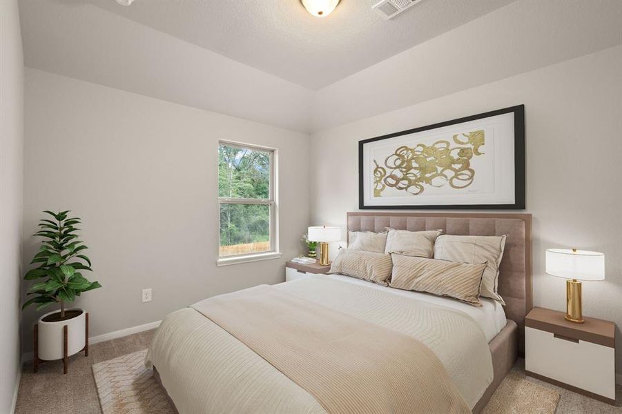 Your secondary bedroom features plush carpet, fresh paint, closet, and a large window that lets in plenty of natural lighting.