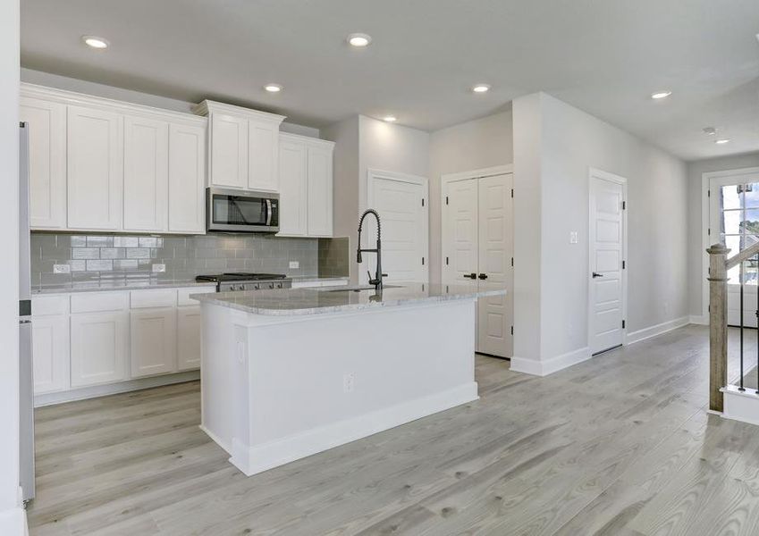 You will love the extra storage space in the oversized kitchen cabinets.