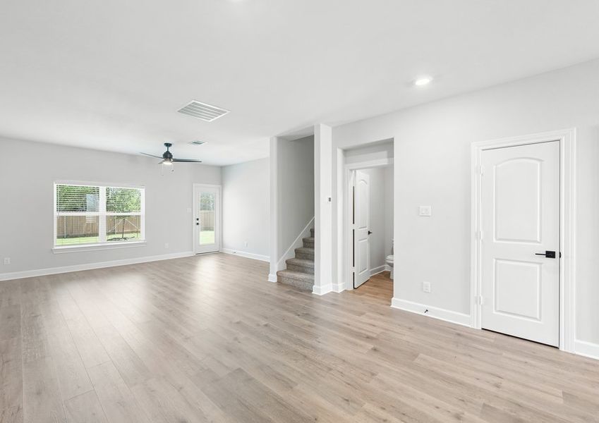 The dining room sits in between the kitchen and family room.