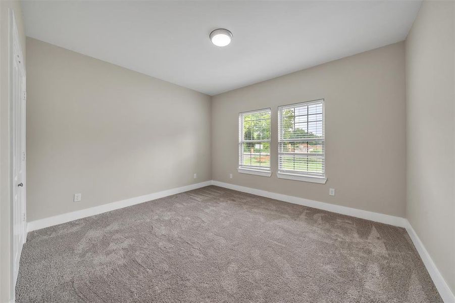 Guest room featuring carpet flooring