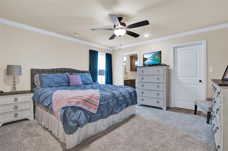 Primary bedroom is oversized and has ensuite bathroom and walk in closet.